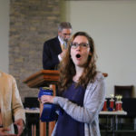 Woman singing at Calvary Christian School