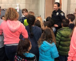 Calvary Christian School students talking with a police officer