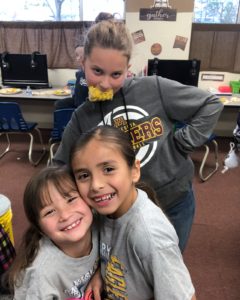 Three girls posing for a photo at Calvary Christian School