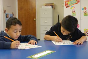 Boys working on an activity in Kindergarten at Calvary Christian School